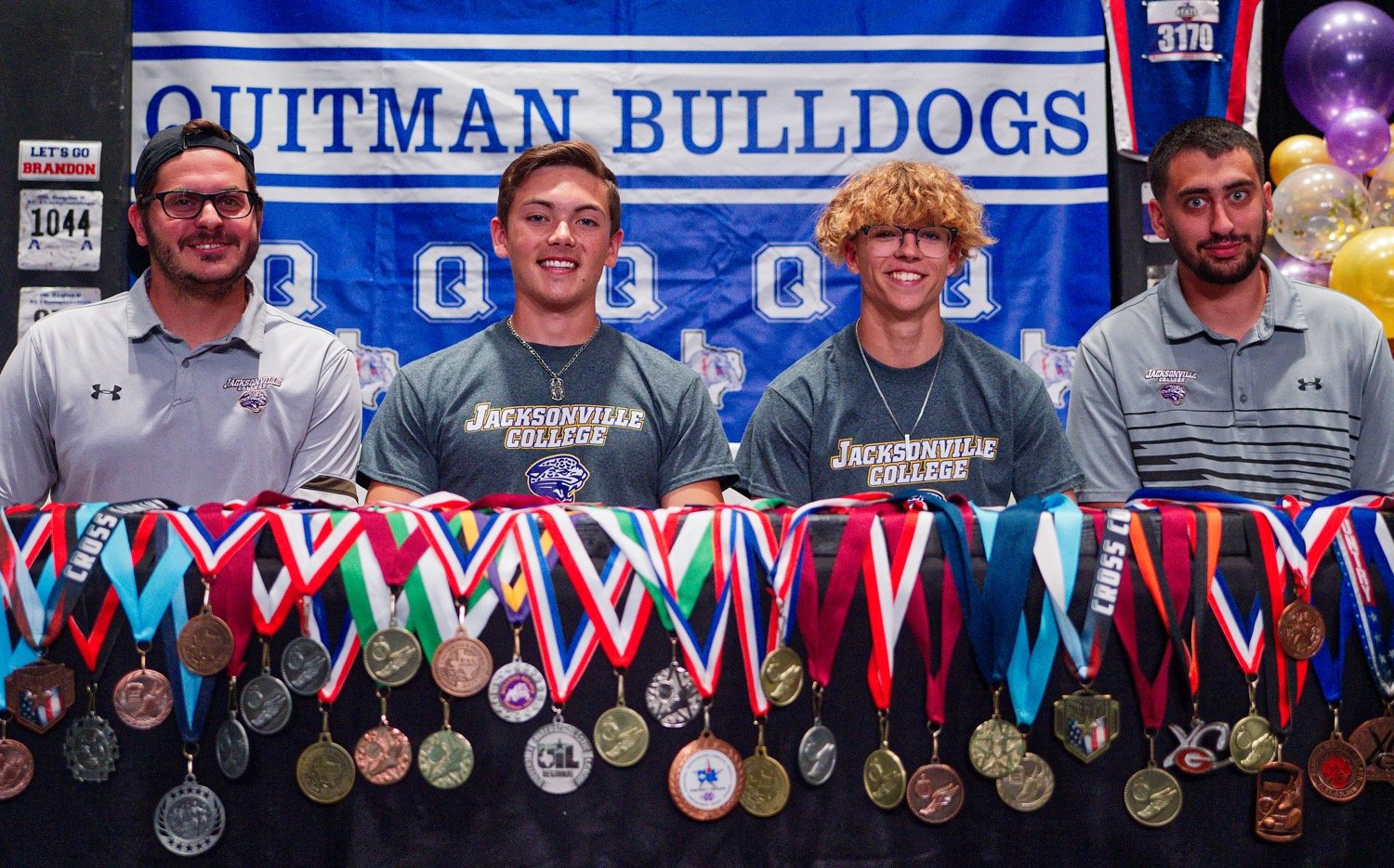 Jacksonville College athletic director and head track coach Kirby Shepherd, left, with Brandon Jimenez and Jack Tannebaum of Quitman and assistant Coach Jacob Rowland, a Quitman grad. [see more signing celebrations]